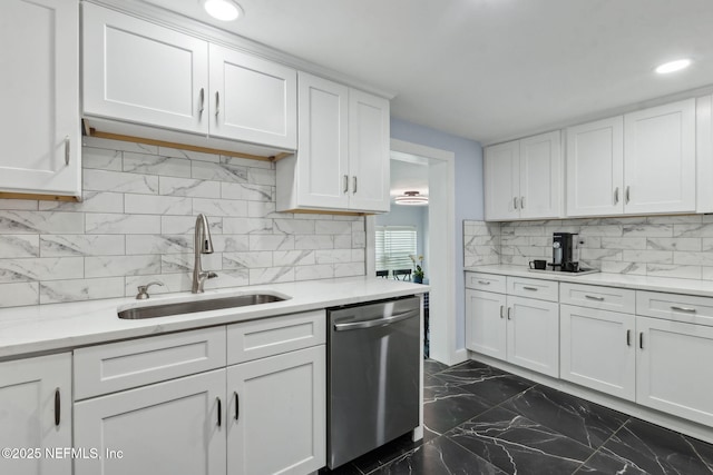 1874 Clinch Dr, Fernandina Beach, FL 32034 - kitchen with a sink, stainless steel dishwasher, decorative backsplash, white cabinets, and recessed lighting