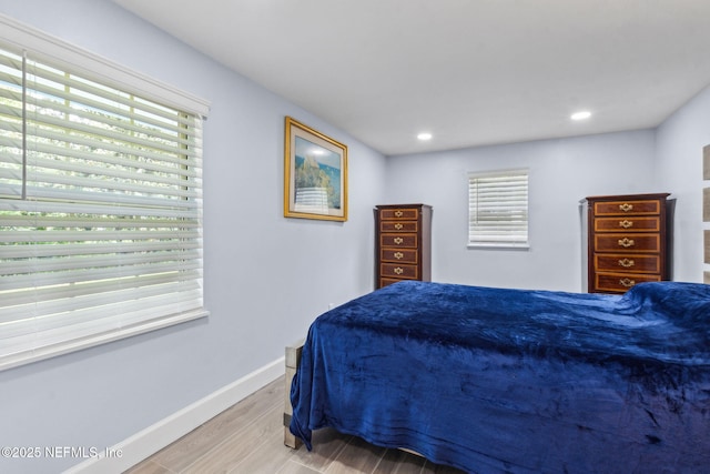 1874 Clinch Dr, Fernandina Beach, FL 32034 - bedroom featuring wood finished floors, baseboards, and recessed lighting