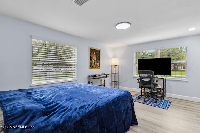 1874 Clinch Dr, Fernandina Beach, FL 32034 - bedroom with wood finished floors and baseboards