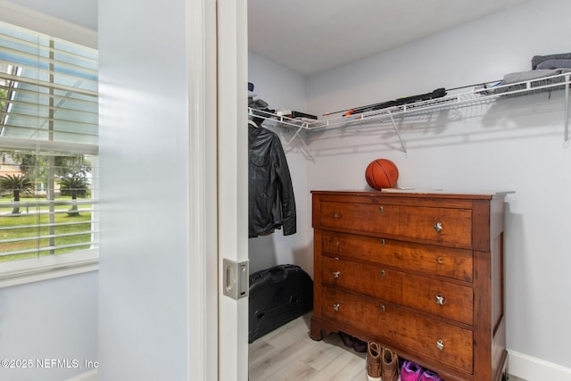 1874 Clinch Dr, Fernandina Beach, FL 32034 - walk in closet with light wood finished floors
