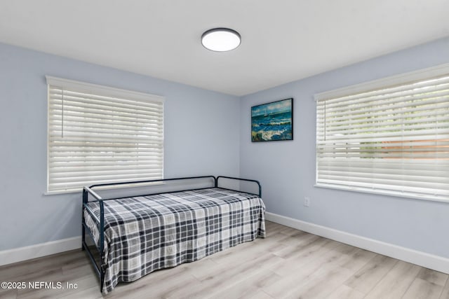 1874 Clinch Dr, Fernandina Beach, FL 32034 - bedroom with baseboards and wood finished floors