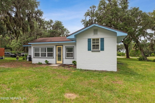 1874 Clinch Dr, Fernandina Beach, FL 32034 - view of front of property with a front lawn