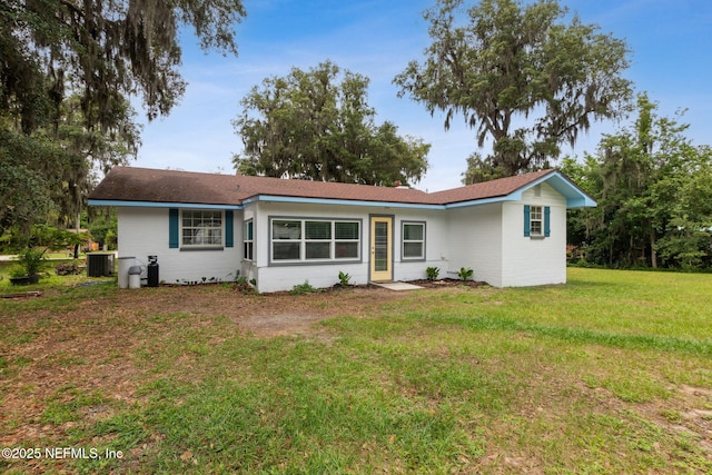 1874 Clinch Dr, Fernandina Beach, FL 32034 - view of front of home featuring cooling unit and a front lawn