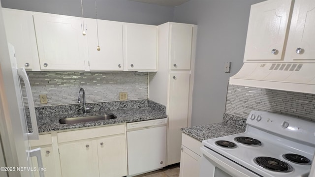 4309 Plaza Gate Ln Unit 201, Jacksonville, FL 32217 - kitchen featuring white appliances, a sink, custom range hood, decorative backsplash, and dark stone counters
