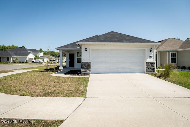 1863 Maxine Branch Way, Jacksonville, FL 32218 - ranch-style house featuring an attached garage, a front yard, concrete driveway, and stone siding