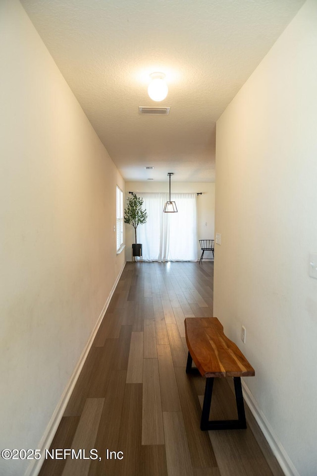 1863 Maxine Branch Way, Jacksonville, FL 32218 - hallway featuring baseboards and dark wood-style flooring