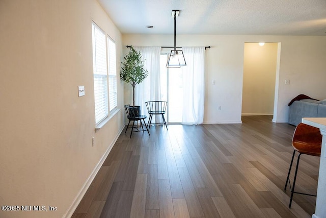 1863 Maxine Branch Way, Jacksonville, FL 32218 - sitting room with healthy amount of natural light, baseboards, and wood finished floors