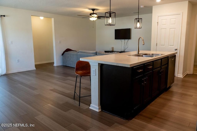 1863 Maxine Branch Way, Jacksonville, FL 32218 - kitchen with a sink, open floor plan, light countertops, a ceiling fan, and dishwasher