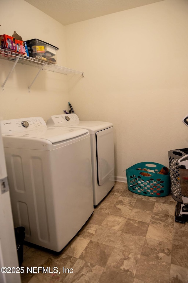 1863 Maxine Branch Way, Jacksonville, FL 32218 - laundry room featuring washer and dryer and baseboards
