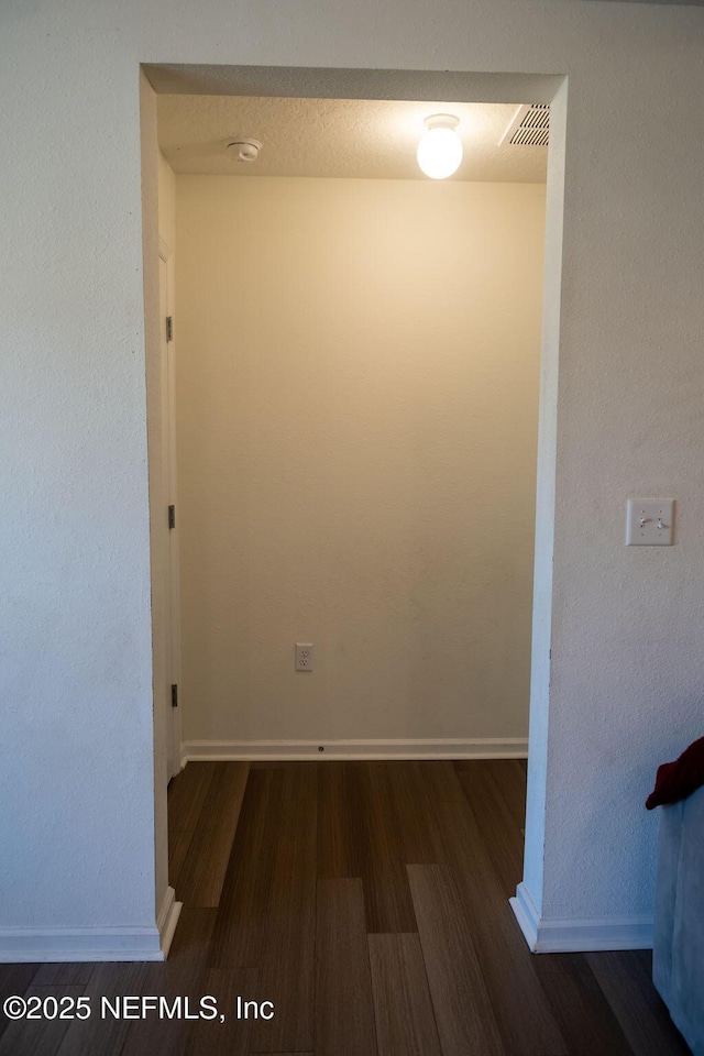 1863 Maxine Branch Way, Jacksonville, FL 32218 - hallway featuring wood finished floors and baseboards