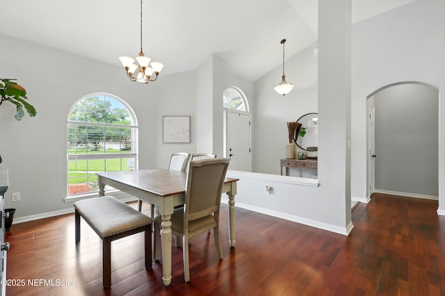 100 Bracken Ct, Saint Johns, FL 32259 - dining room featuring arched walkways, healthy amount of natural light, wood finished floors, a chandelier, and high vaulted ceiling