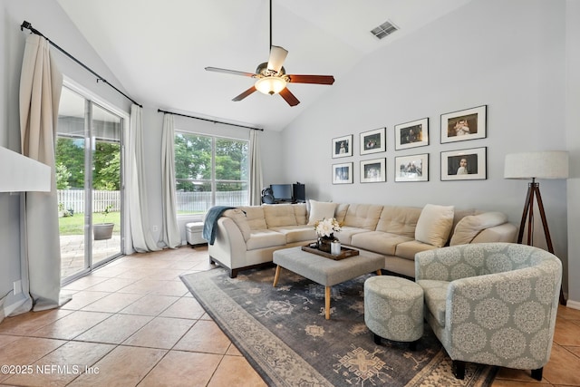 100 Bracken Ct, Saint Johns, FL 32259 - living area featuring a ceiling fan, light tile patterned floors, and high vaulted ceiling
