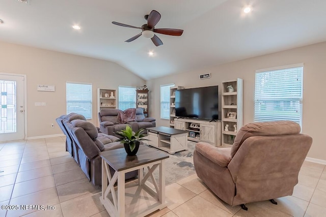 living area featuring lofted ceiling, a ceiling fan, light tile patterned flooring, baseboards, and recessed lighting