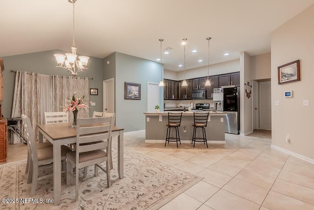 dining area with light tile patterned flooring, recessed lighting, a chandelier, baseboards, and vaulted ceiling