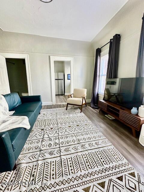 38 E 16th St, Jacksonville, FL 32206 - living room with wood finished floors and baseboards