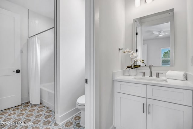 full bath with toilet, vanity, shower / tub combo, and tile patterned flooring