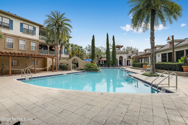 12700 Bartram Park Blvd Unit 123, Jacksonville, FL 32258 - community pool with a patio area and a residential view