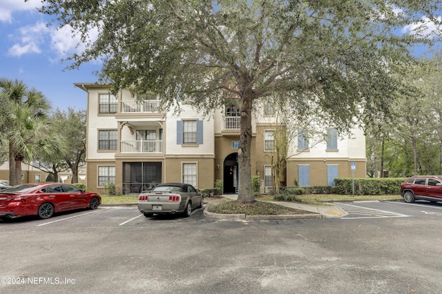 12700 Bartram Park Blvd Unit 123, Jacksonville, FL 32258 - view of property featuring uncovered parking