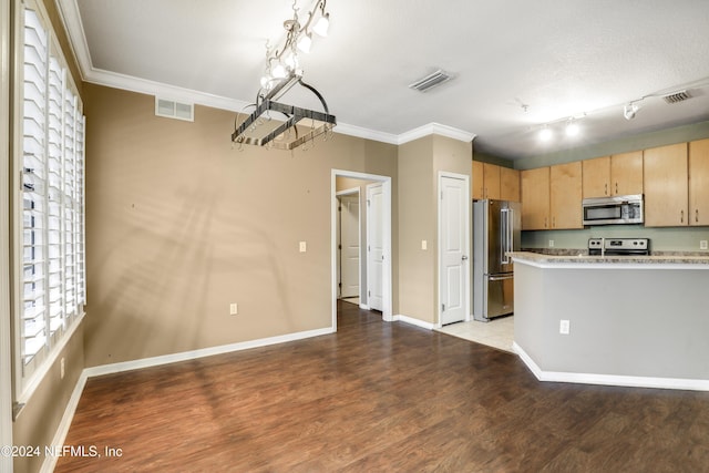 12700 Bartram Park Blvd Unit 123, Jacksonville, FL 32258 - kitchen with appliances with stainless steel finishes, ornamental molding, light wood-style flooring, baseboards, and light brown cabinetry