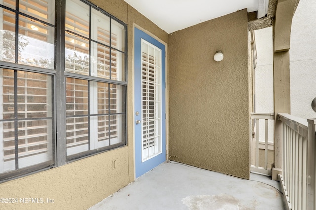 12700 Bartram Park Blvd Unit 123, Jacksonville, FL 32258 - doorway to property featuring stucco siding