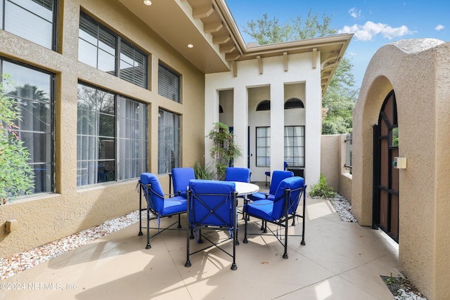 12700 Bartram Park Blvd Unit 123, Jacksonville, FL 32258 - view of patio / terrace with outdoor dining area and a gate
