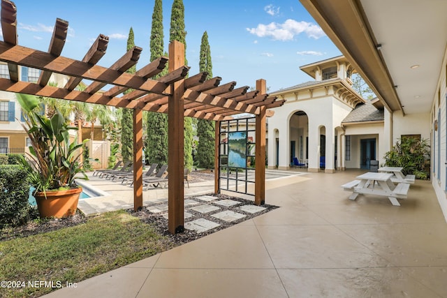 12700 Bartram Park Blvd Unit 123, Jacksonville, FL 32258 - view of patio with a pergola and an outdoor pool