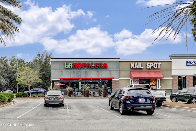 12700 Bartram Park Blvd Unit 123, Jacksonville, FL 32258 - view of commercial property featuring uncovered parking