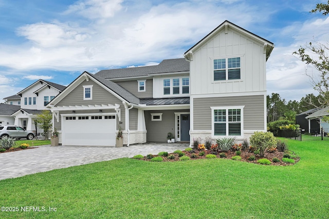 94 Anthem Ridge Dr, Ponte Vedra, FL 32081 - view of front of home featuring a standing seam roof, decorative driveway, metal roof, board and batten siding, and covered porch