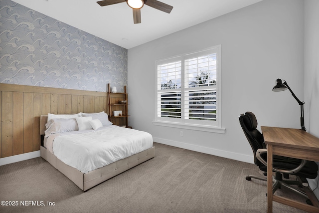 94 Anthem Ridge Dr, Ponte Vedra, FL 32081 - carpeted bedroom featuring a desk, baseboards, a ceiling fan, and wood walls