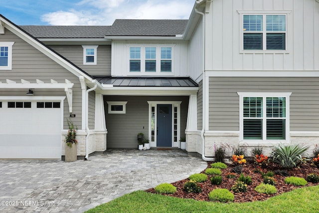94 Anthem Ridge Dr, Ponte Vedra, FL 32081 - view of front of house featuring a standing seam roof, metal roof, board and batten siding, covered porch, and a shingled roof