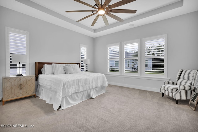 94 Anthem Ridge Dr, Ponte Vedra, FL 32081 - carpeted bedroom featuring a raised ceiling, baseboards, and ceiling fan