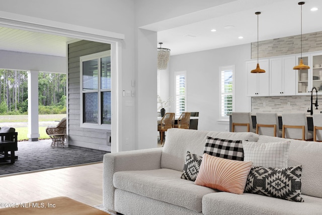 94 Anthem Ridge Dr, Ponte Vedra, FL 32081 - living room featuring wood finished floors and recessed lighting