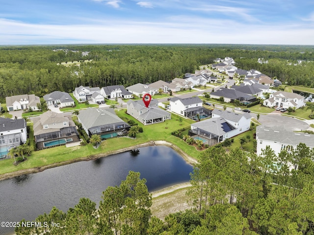 94 Anthem Ridge Dr, Ponte Vedra, FL 32081 - aerial overview of property's location with a forest, nearby suburban area, and a nearby body of water
