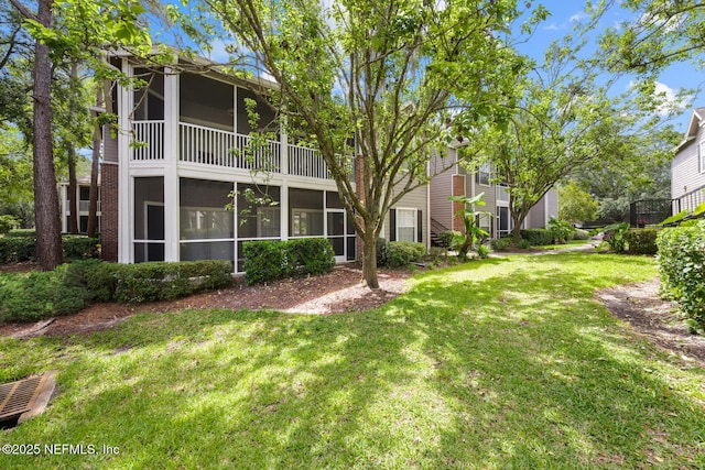 10000 Gate Pkwy Unit 2123, Jacksonville, FL 32246 - view of grassy yard with a sunroom