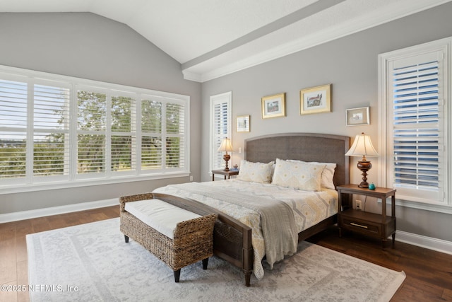 96321 Bay View Dr, Fernandina Beach, FL 32034 - bedroom featuring vaulted ceiling, multiple windows, wood finished floors, and baseboards