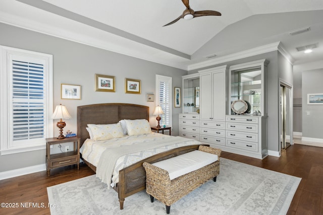 96321 Bay View Dr, Fernandina Beach, FL 32034 - bedroom with dark wood-style flooring, baseboards, ornamental molding, lofted ceiling, and a ceiling fan
