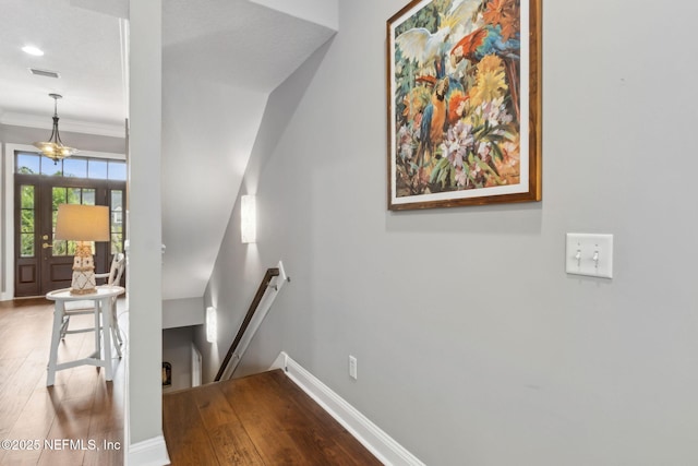 96321 Bay View Dr, Fernandina Beach, FL 32034 - staircase featuring wood finished floors, baseboards, crown molding, and recessed lighting