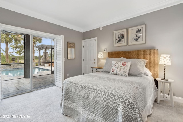 96321 Bay View Dr, Fernandina Beach, FL 32034 - carpeted bedroom featuring access to exterior, ornamental molding, and baseboards