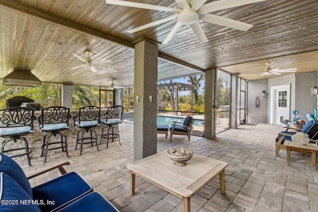 96321 Bay View Dr, Fernandina Beach, FL 32034 - view of patio / terrace featuring a ceiling fan, an outdoor pool, and a bar