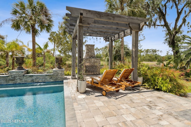 96321 Bay View Dr, Fernandina Beach, FL 32034 - swimming pool featuring an outdoor stone fireplace, a patio area, and a pergola