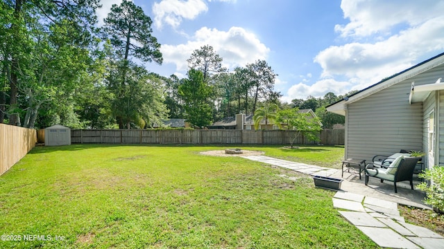 11428 Rustic Pines Cir E, Jacksonville, FL 32257 - view of yard featuring a fire pit and a patio