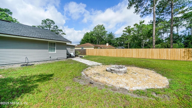 11428 Rustic Pines Cir E, Jacksonville, FL 32257 - view of yard featuring an outdoor fire pit