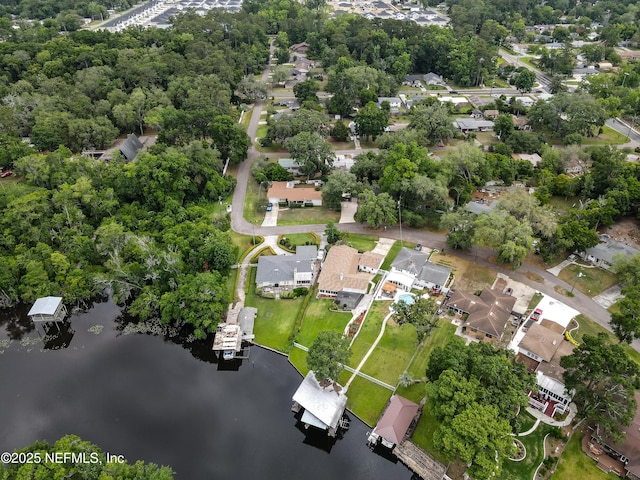 5476 Waterside Dr, Jacksonville, FL 32210 - aerial overview of property's location with a nearby body of water, nearby suburban area, and a tree filled landscape