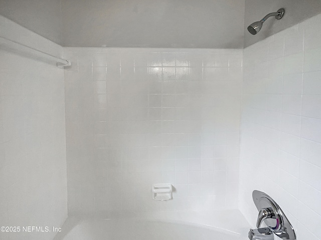 full bathroom with a shower and a tub