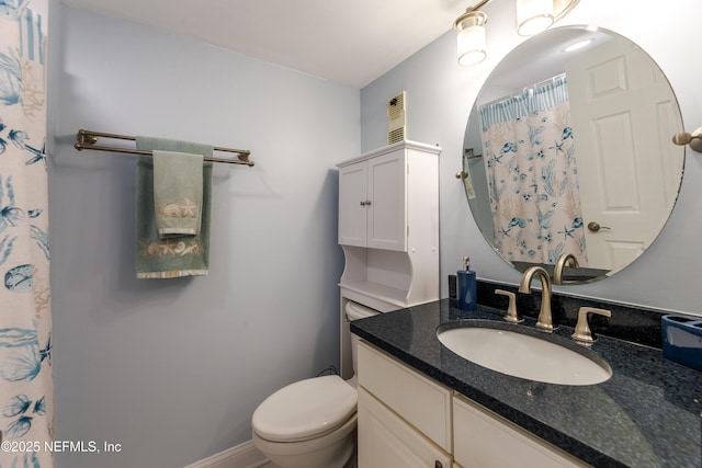 1301 1st St S Unit 1403, Jacksonville Beach, FL 32250 - bathroom with toilet, vanity, and a shower with shower curtain