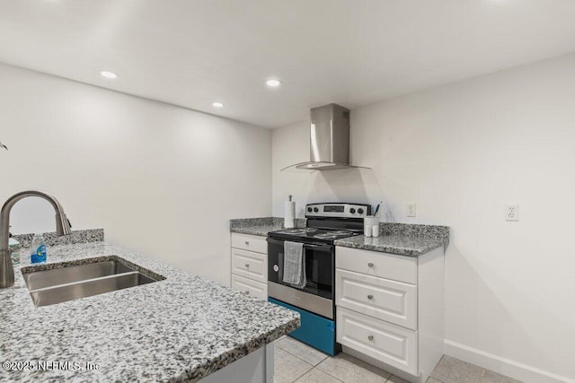 2885 Sand Castle Ln, Jacksonville, FL 32233 - kitchen featuring stainless steel electric range oven, wall chimney exhaust hood, a sink, white cabinetry, and light stone countertops