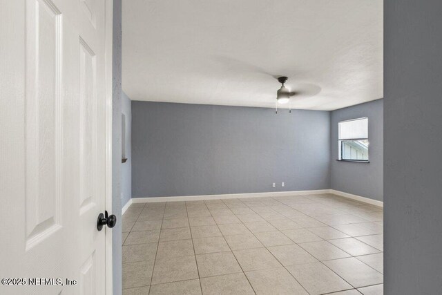 2885 Sand Castle Ln, Jacksonville, FL 32233 - unfurnished room featuring a ceiling fan, light tile patterned floors, and baseboards