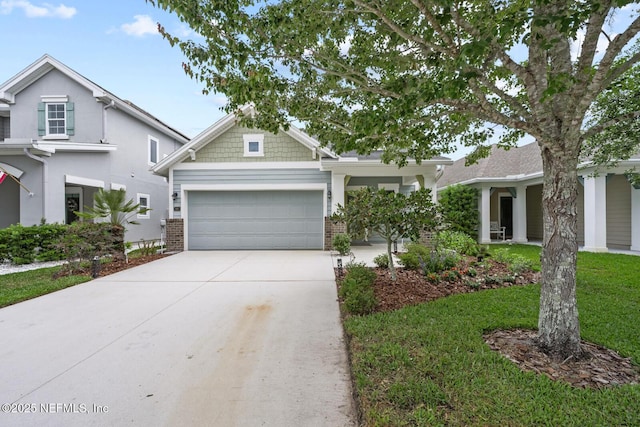 107 Park Lake Dr, Ponte Vedra, FL 32081 - view of front of property with an attached garage, driveway, brick siding, and a front lawn