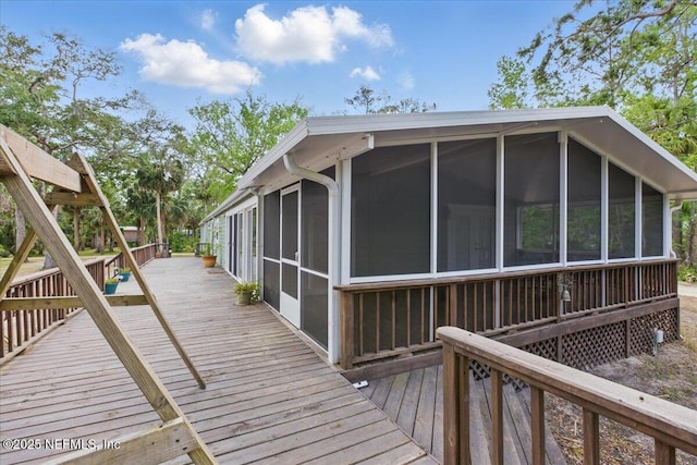 1418 Palm St NE, Steinhatchee, FL 32359 - wooden deck with a sunroom