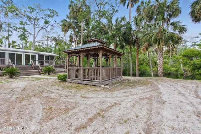 1418 Palm St NE, Steinhatchee, FL 32359 - surrounding community with a gazebo and a wooden deck